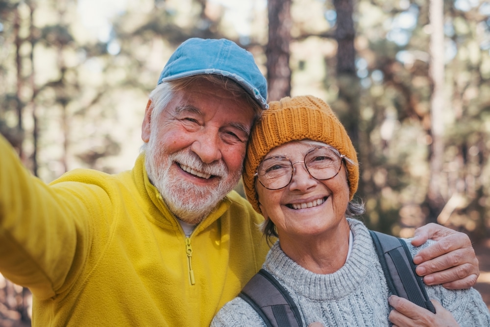 couple smiling and well rested after sleep apnea treatment in Ocala