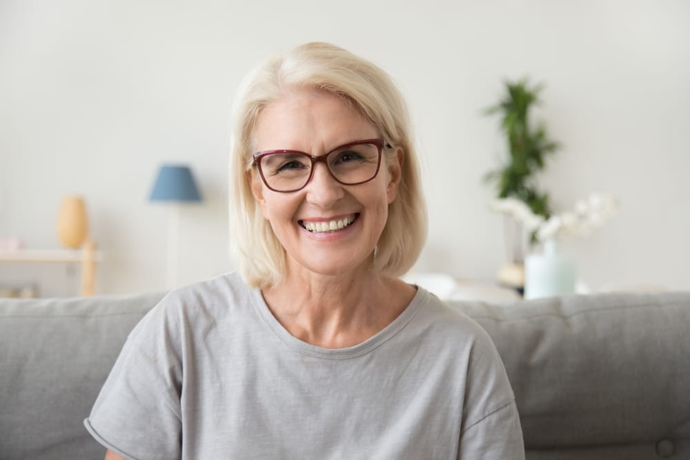 Ocala, FL woman showing off dental implants