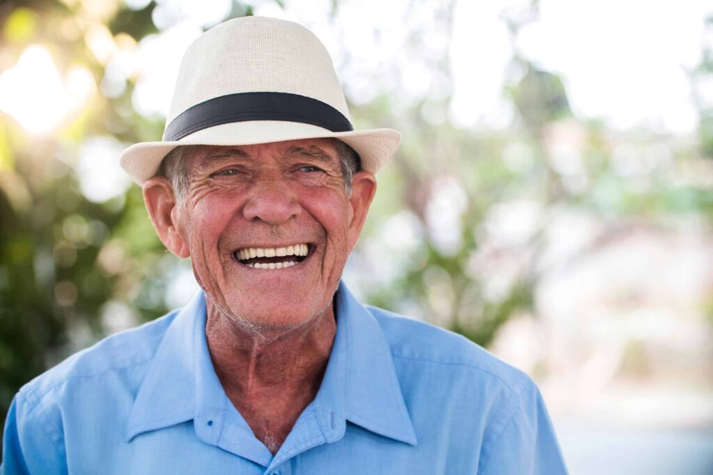 man showing off healthy teeth after root canal treatment in Ocala FL