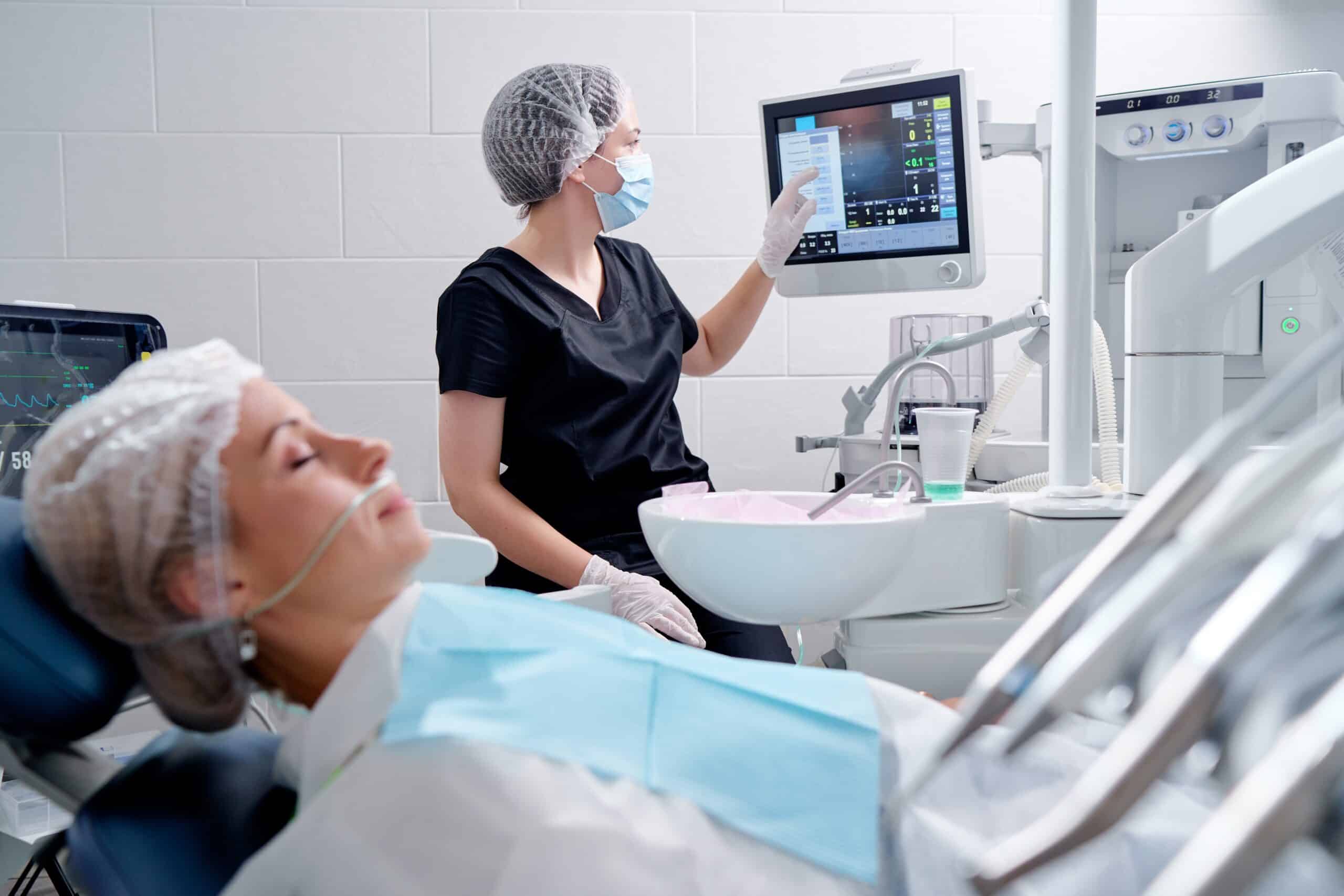 female patient relaxed in modern dental chair